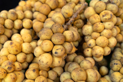 Close-up of onions for sale at market stall