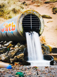 Water flowing from pipe