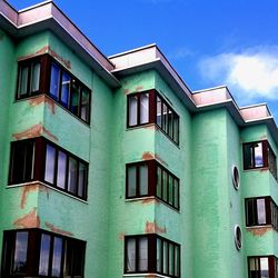 Low angle view of residential building against sky