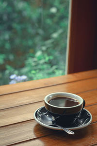 Coffee cup on table