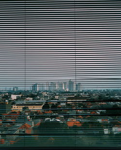 Full frame shot of modern buildings against sky