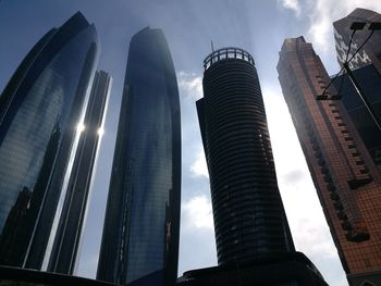 Low angle view of modern buildings against sky