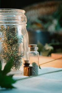 Glass jars filled with herbs