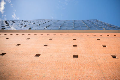 Low angle view of building against blue sky