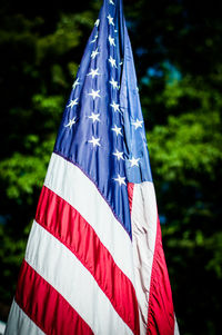 Close-up of flag against blue sky