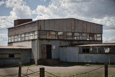 Abandoned building against sky