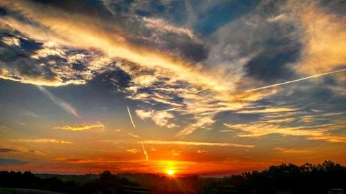 Scenic view of dramatic sky during sunset