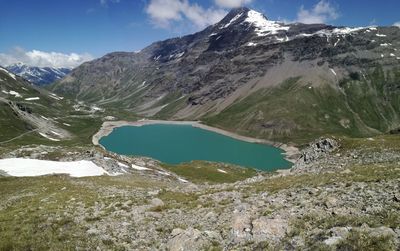 Scenic view of snowcapped mountains against sky