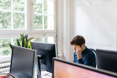 High angle view of man working at office