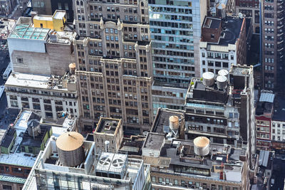 Aerial close up view of crowded buildings in new york city on a sunny day. nyc, usa.