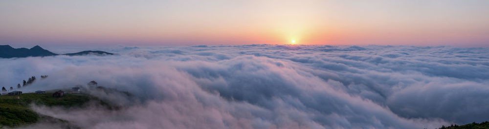 Scenic view of mountains against sky during sunset
