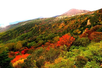 Scenic view of mountains against sky during autumn