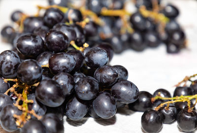 High angle view of grapes on table