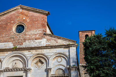 Low angle view of old building against sky