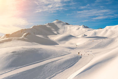 Scenic view of snowcapped mountain against sky