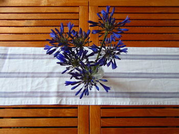 Close-up of flower vase on table at home