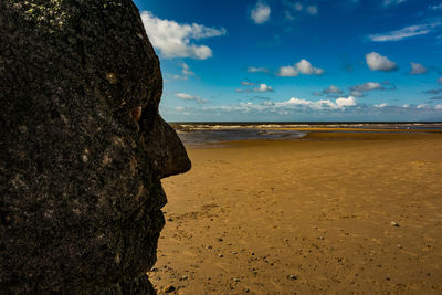 Scenic view of beach against sky