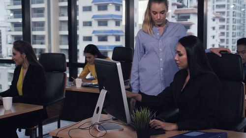 Group of people working on table