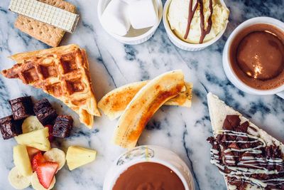 High angle view of breakfast served on table