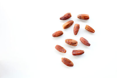 High angle view of fruits against white background