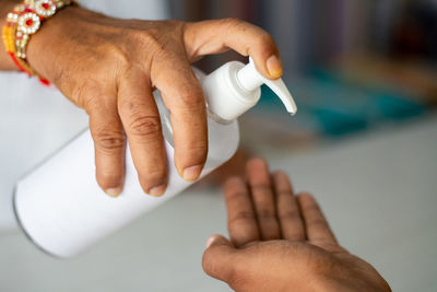 Close-up of woman holding hands