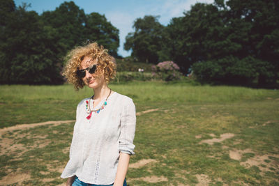 Woman standing on field