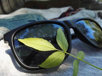 Close-up of sunglasses on table