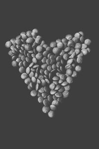 Close-up of heart shape over black background