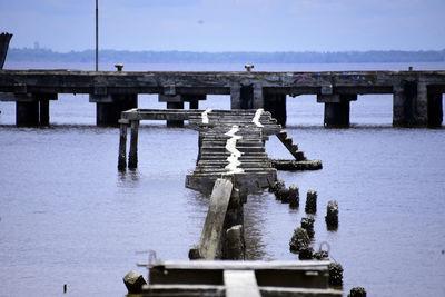 Bridge over river against sky