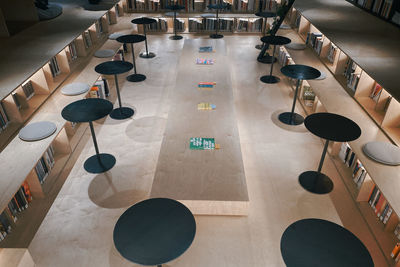 High angle view of empty seats on tiled floor