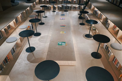 High angle view of empty seats on tiled floor