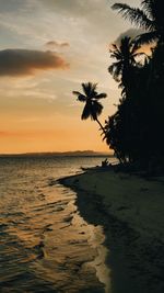 Scenic view of sea against sky at sunset