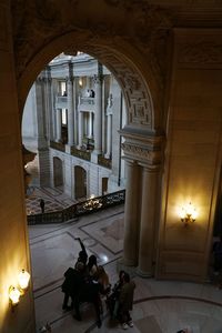 High angle view of people in corridor of building