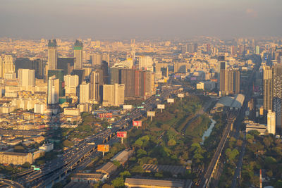 High angle view of buildings in city against sky