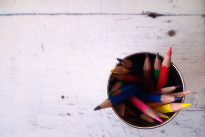High angle view of colored pencils on table