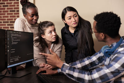 Business colleagues working at office