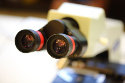 Close-up of camera on table