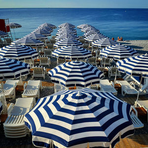 High angle view of chairs on beach