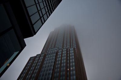 Low angle view of modern buildings against clear sky