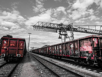 Train on railroad track against sky