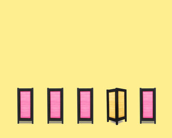 Close-up of multi colored pencils over white background