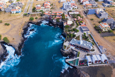 High angle view of swimming pool by building