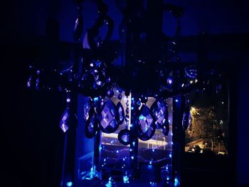 Close-up of illuminated lights at night