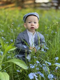 Boy on grassy field