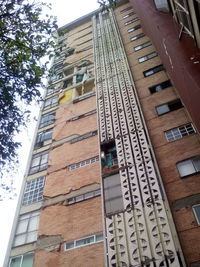 Low angle view of buildings against clear sky