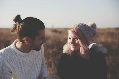 Couple against sky during sunset