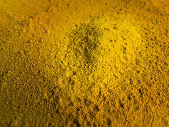 Full frame shot of yellow powder paint