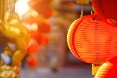 Close-up of illuminated lantern against blurred background