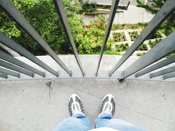 Low section of man standing outdoors