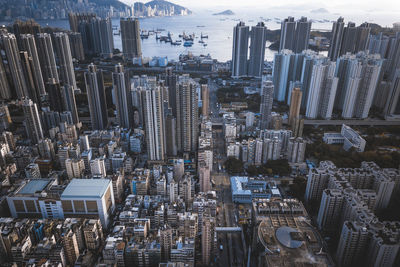 High angle view of modern buildings in city against sky